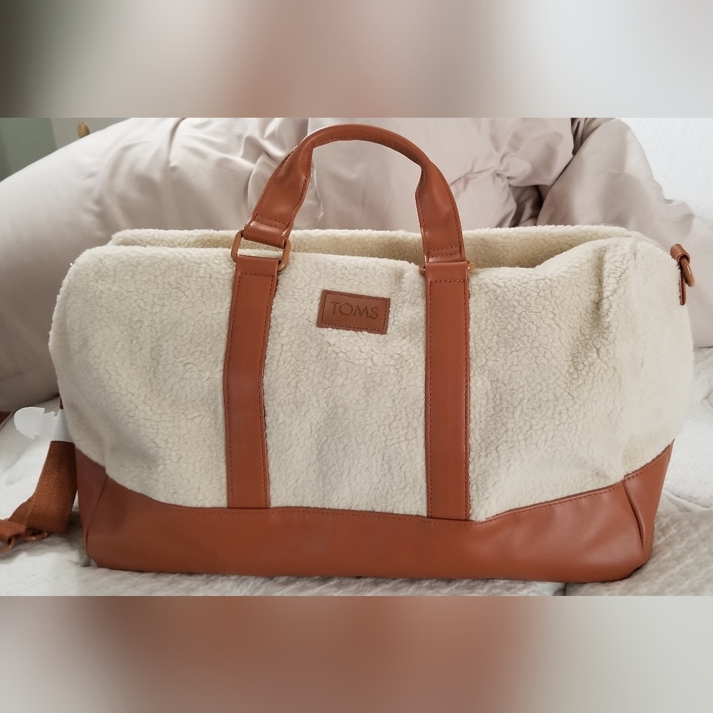 TOMS faux sherpa and faux leather weekender bag